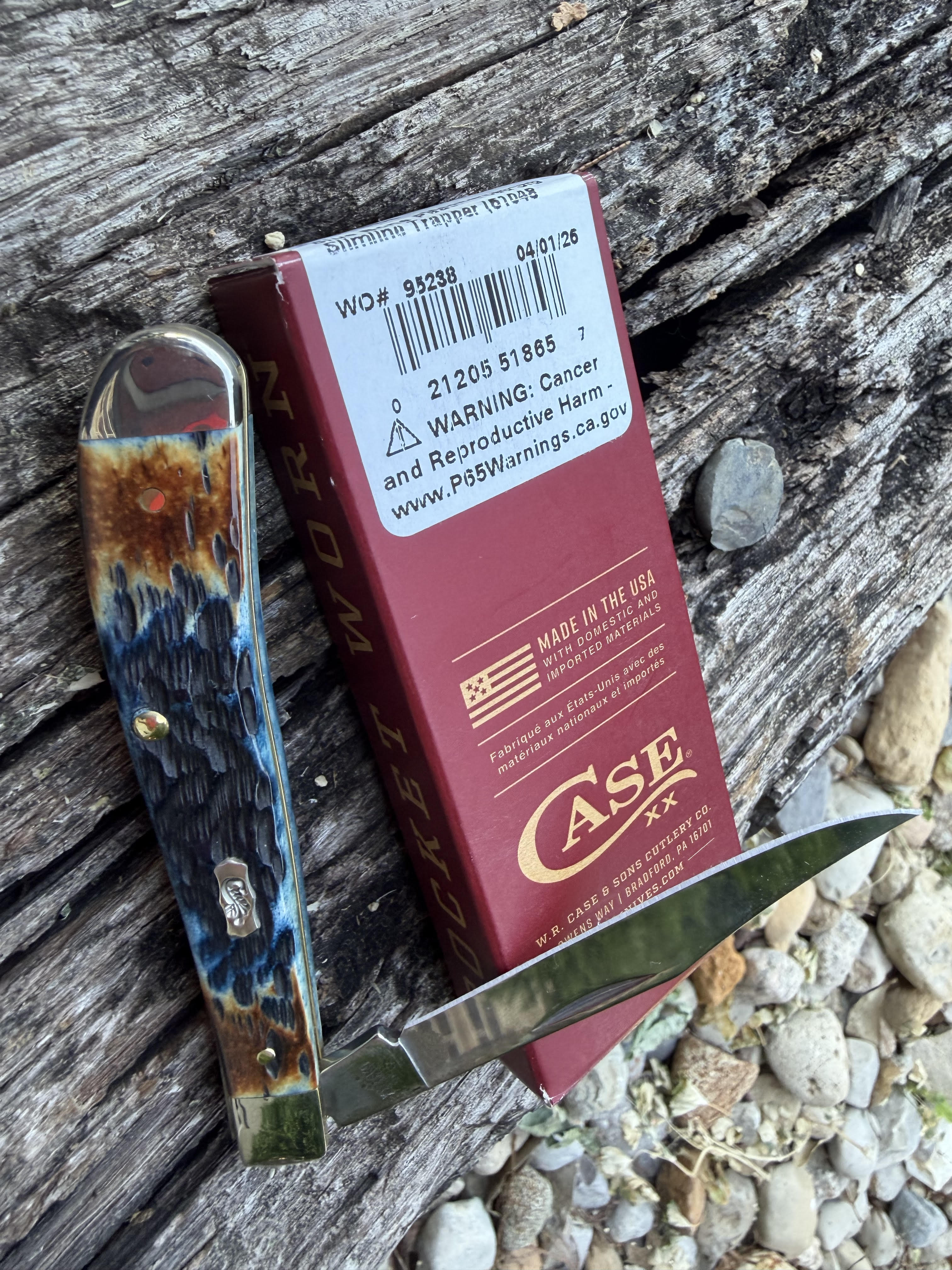 Case XX #51865 - Slimline Trapper - Pocket Worn Peach Seed Jigged Mediterranean Blue Bone